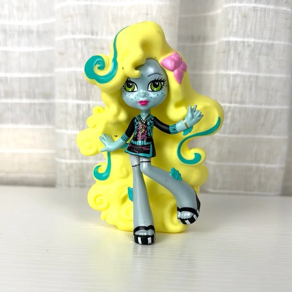 Monter High Lagoona Blue Figure Dol 4” with Yellow Hair and Pink Bow